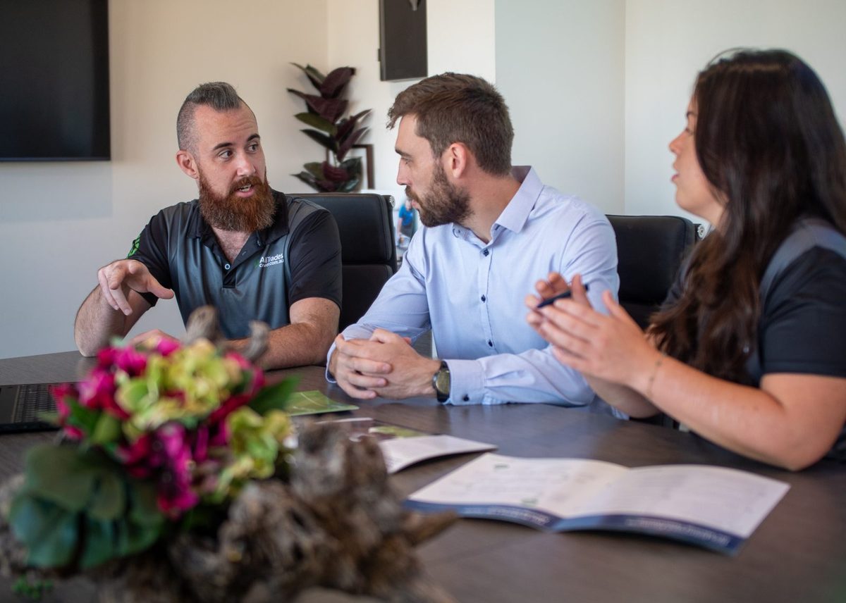 A contract being read through with a client before signing